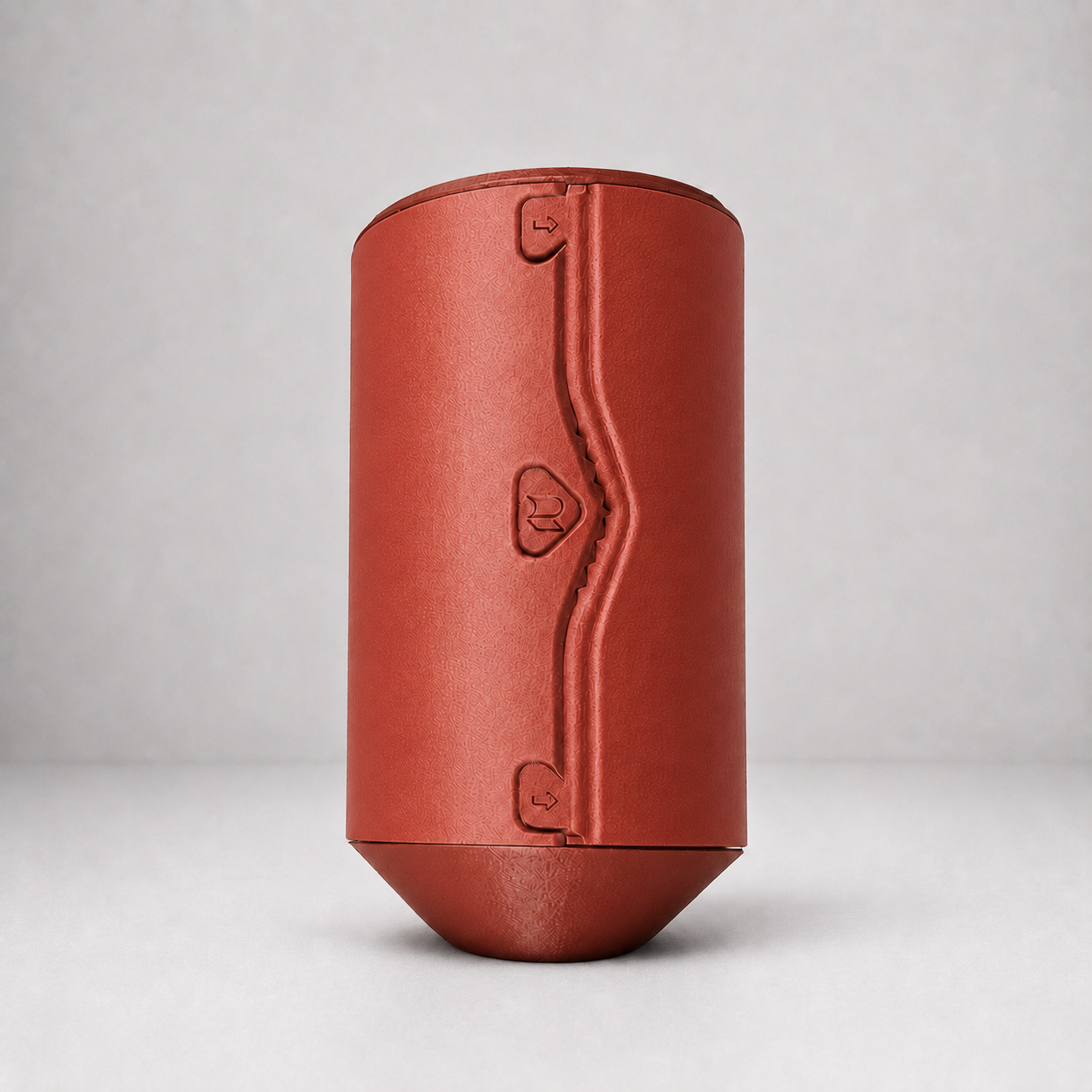 Rollbox Serve Clay Paper Towel dispenser showing the integrated cutting edge and front logo