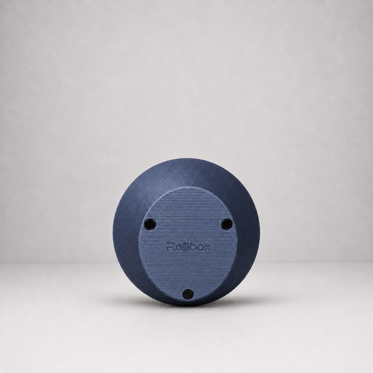 Bottom view of Rollbox Serve Midnight showing the weighted base, grip feet and Rollbox logo