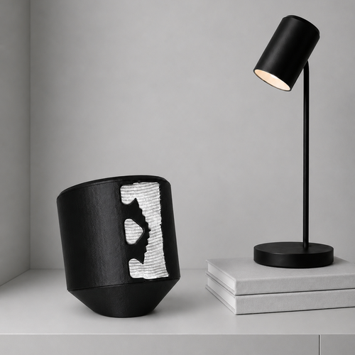 Rollbox Studio Blackout tissue dispenser with paper visible through the front cutting edge