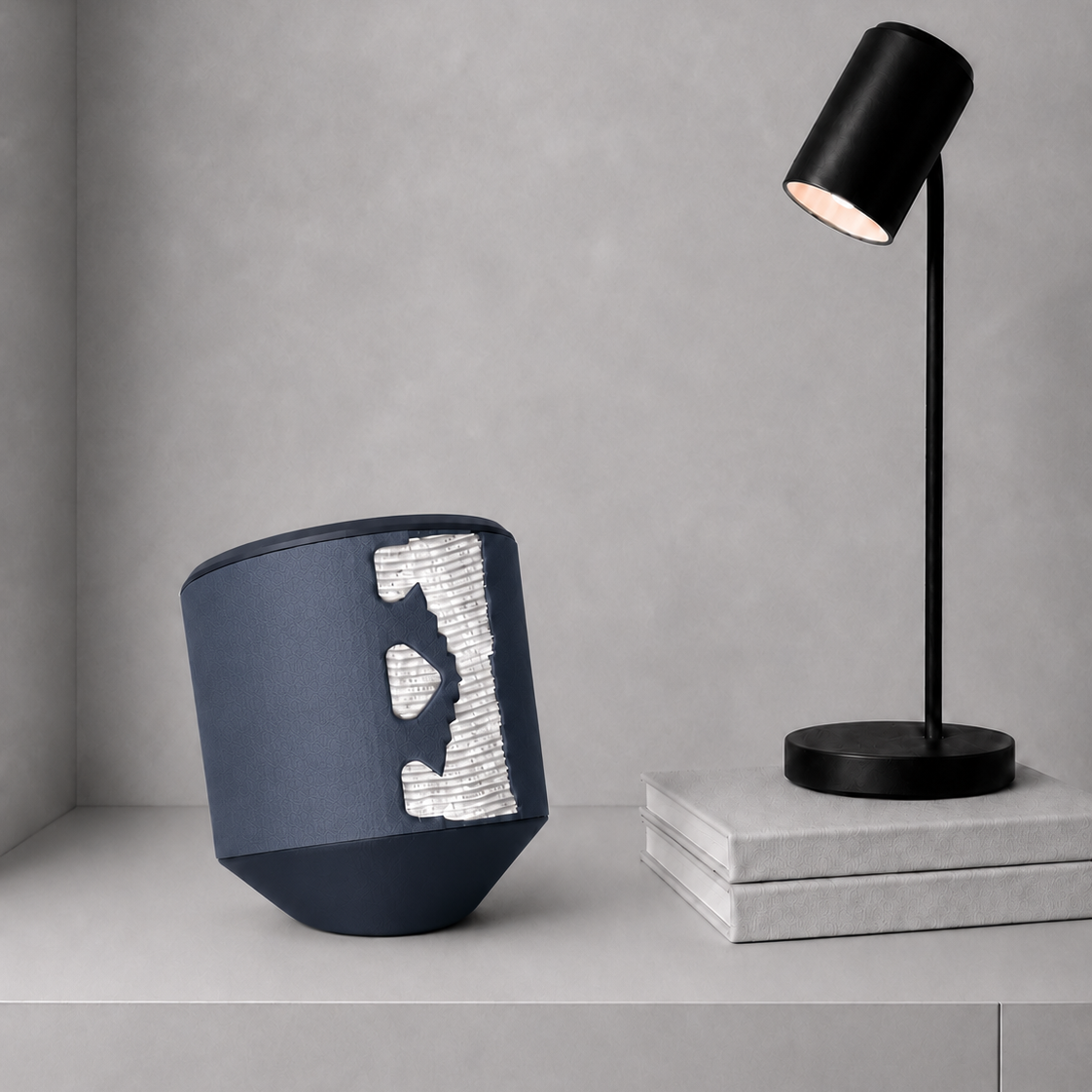Rollbox Studio Midnight tissue dispenser with paper visible through the front cutting edge